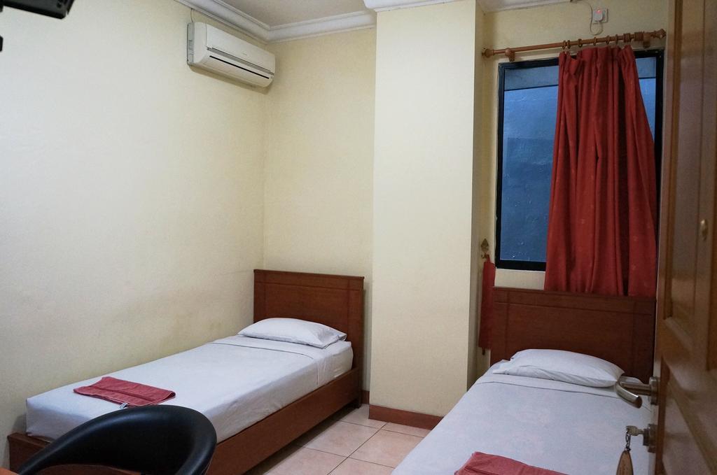 Jesnic Hotel Паданг Номер фото